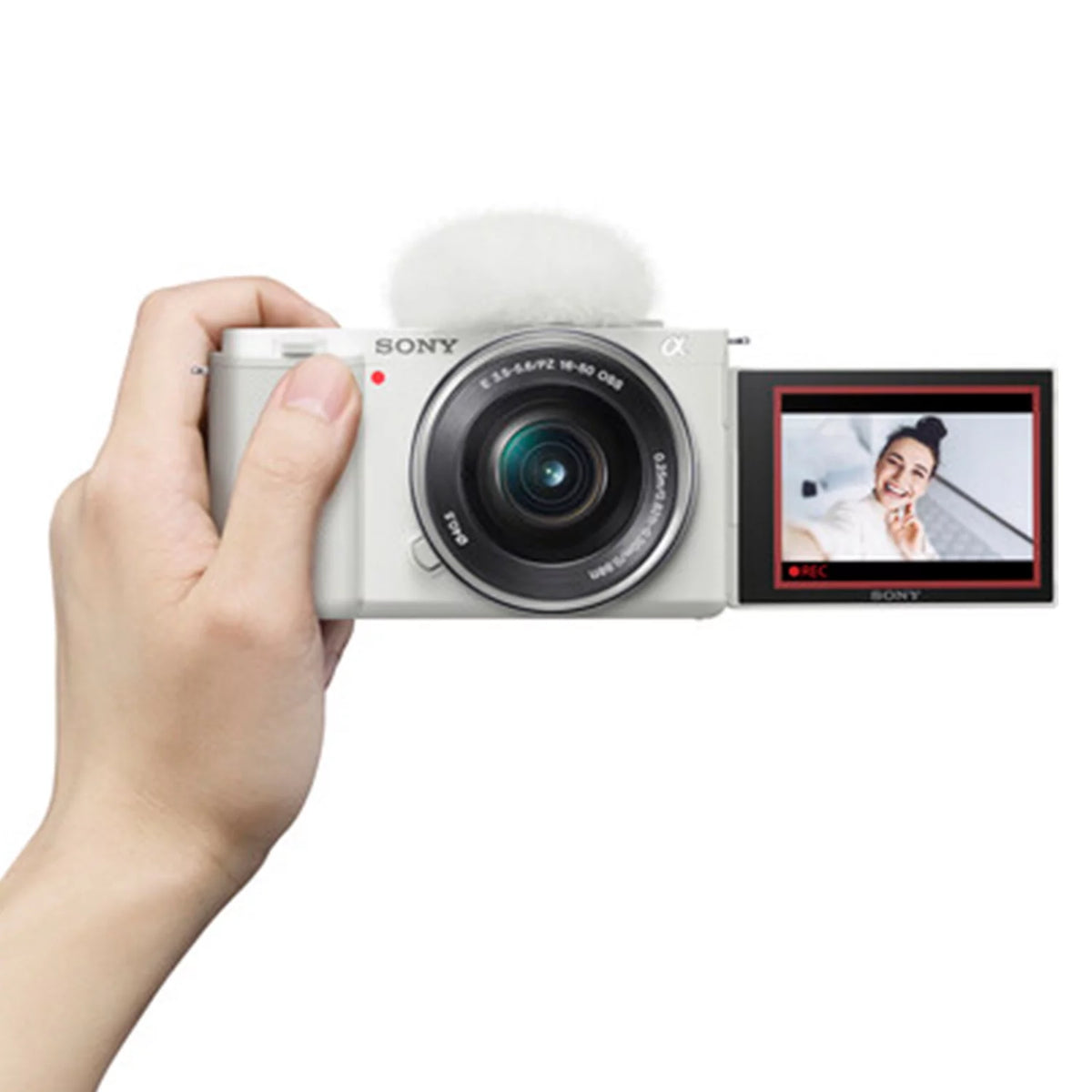 White Mirrorless Camera with 16-50mm Lens O244020